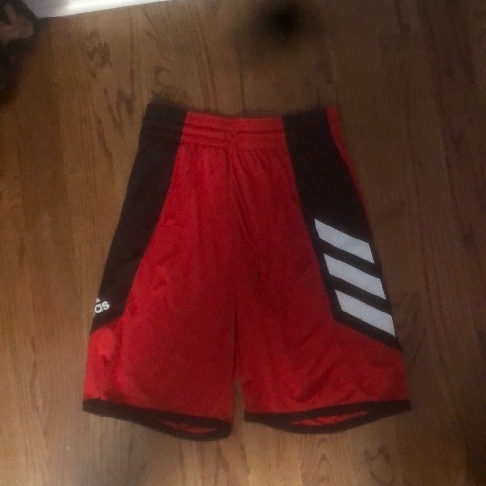 Red adidas basketball shorts, worn a few times perfect condition.